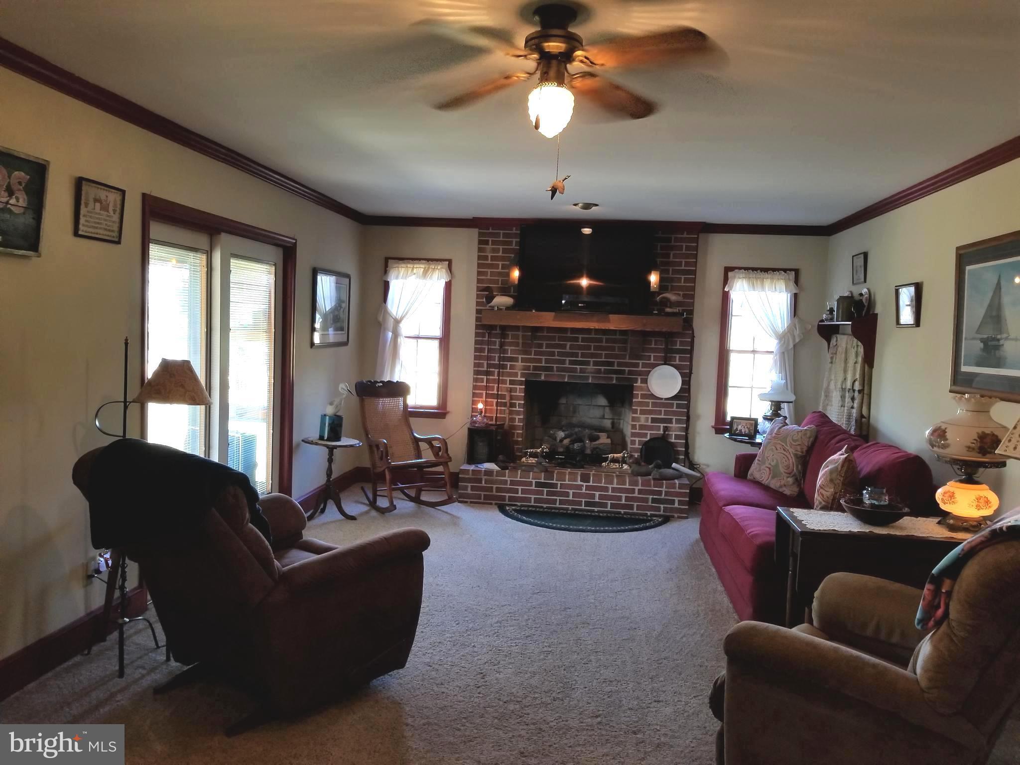 6311 Suicide Bridge Road Hurlock, MD 21643 - Photo 6 of 30 Brick Fireplace With Gas Heat