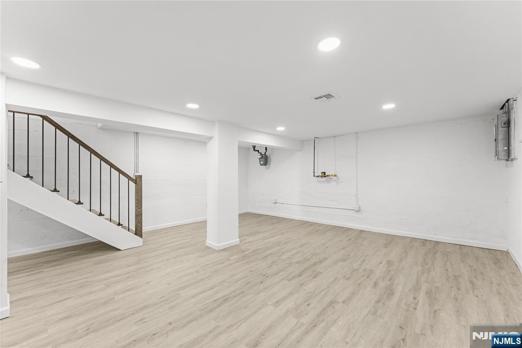 96 Prospect Terrace East Rutherford, NJ 07073 - Photo 19 of 31 a view of an empty room with wooden floor