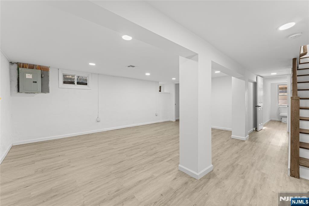 96 Prospect Terrace East Rutherford, NJ 07073 - Photo 22 of 31 a view of a big room with wooden floor and windows