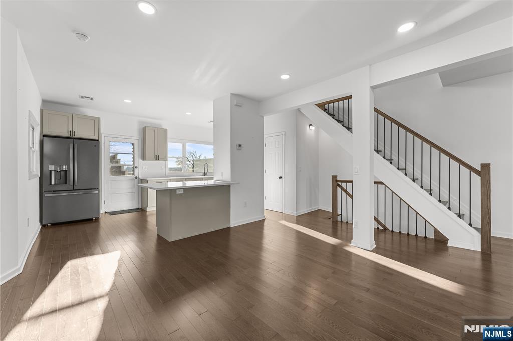 96 Prospect Terrace East Rutherford, NJ 07073 - Photo 5 of 31 a view of kitchen with stainless steel appliances refrigerator oven microwave and cabinets