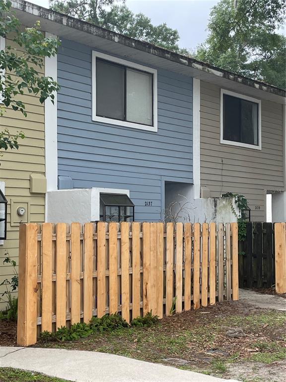 2137 Southwest 39 Way Gainesville, FL 32607 - Photo 1 of 1 a front view of a house with a garden