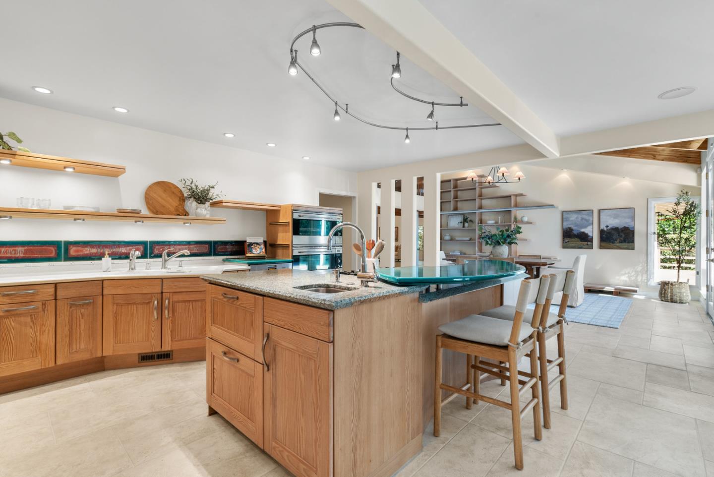 1695 Aptos Creek Road Aptos, CA 95003 - Photo 20 of 76 a kitchen with stainless steel appliances granite countertop a sink and cabinets