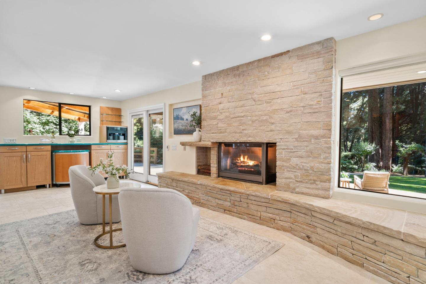 1695 Aptos Creek Road Aptos, CA 95003 - Photo 22 of 76 a living room with furniture a large window and a fireplace