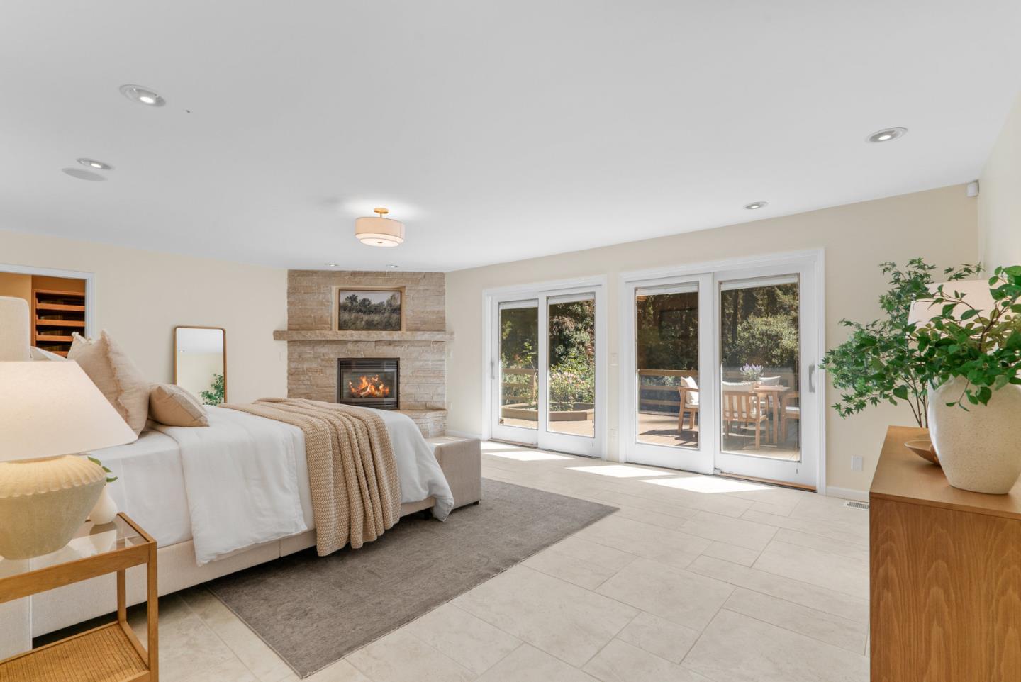 1695 Aptos Creek Road Aptos, CA 95003 - Photo 31 of 76 a spacious bedroom with a bed and a large window