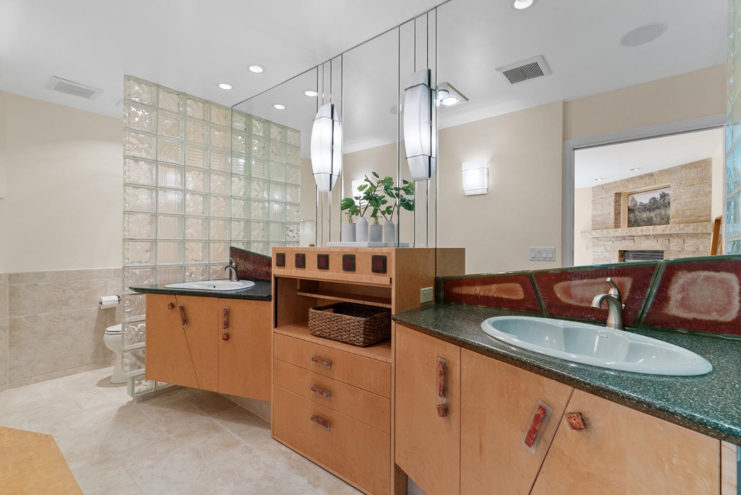 1695 Aptos Creek Road Aptos, CA 95003 - Photo 36 of 76 a kitchen with stainless steel appliances granite countertop a sink and a granite counter tops with white cabinets
