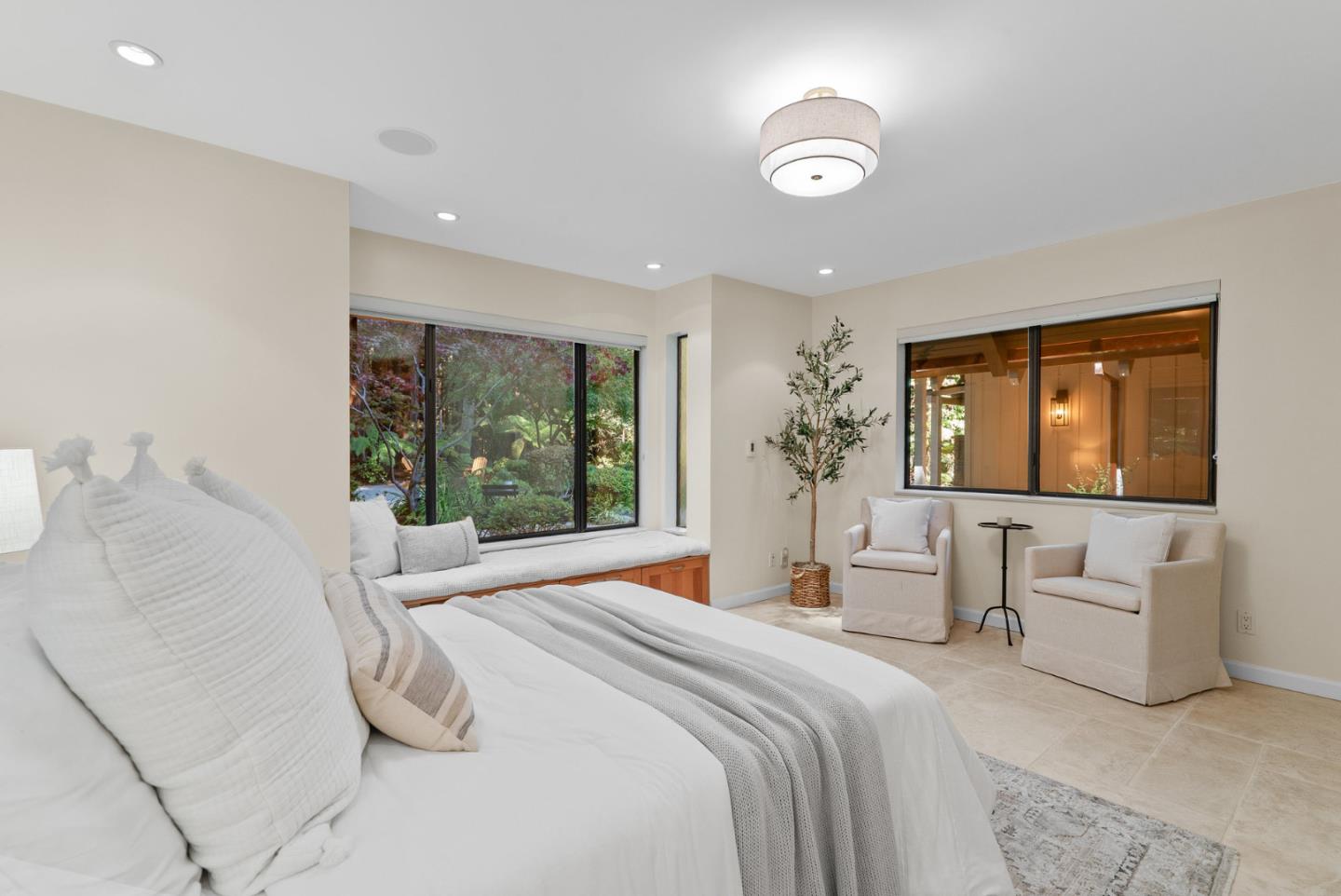 1695 Aptos Creek Road Aptos, CA 95003 - Photo 40 of 76 a bedroom with a large bed and a large window