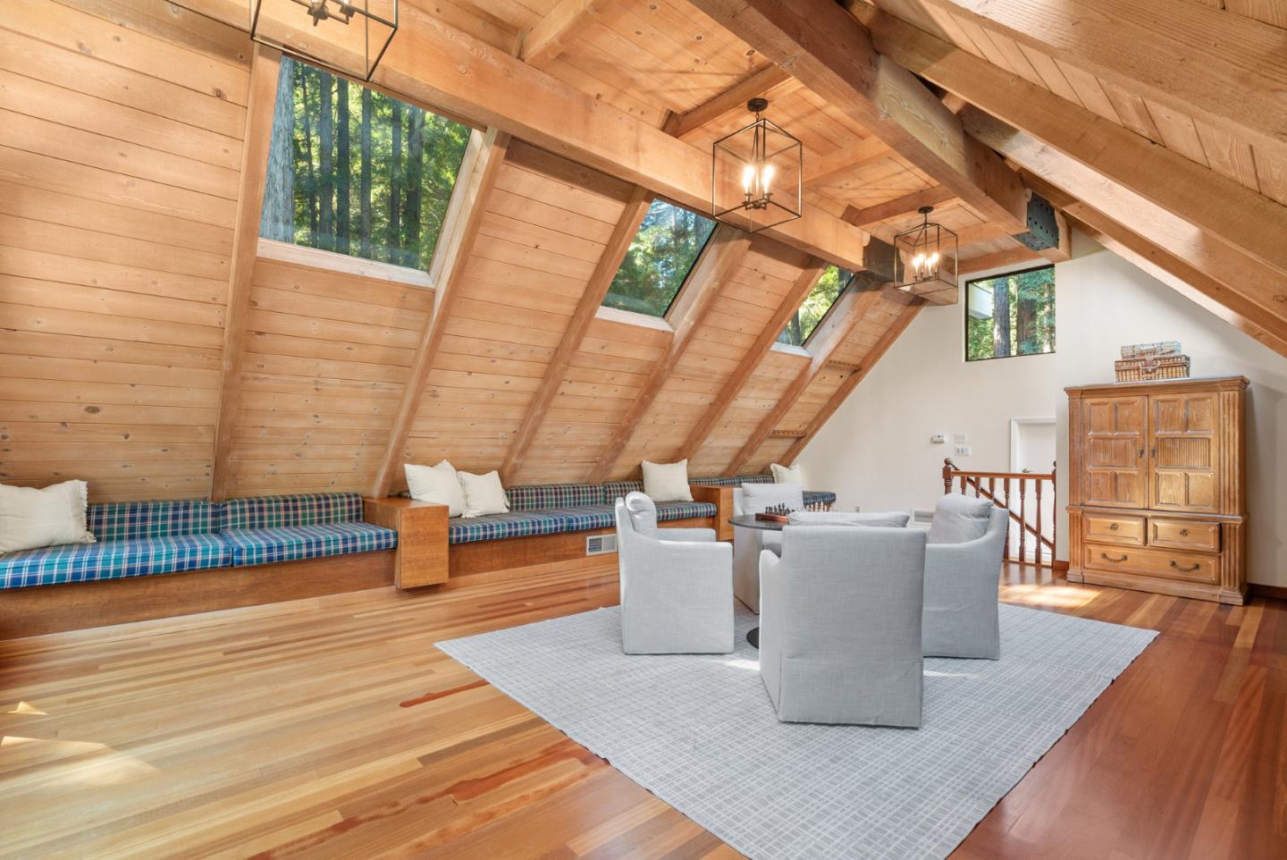 1695 Aptos Creek Road Aptos, CA 95003 - Photo 46 of 76 a view of a patio with couches and table with wooden floor