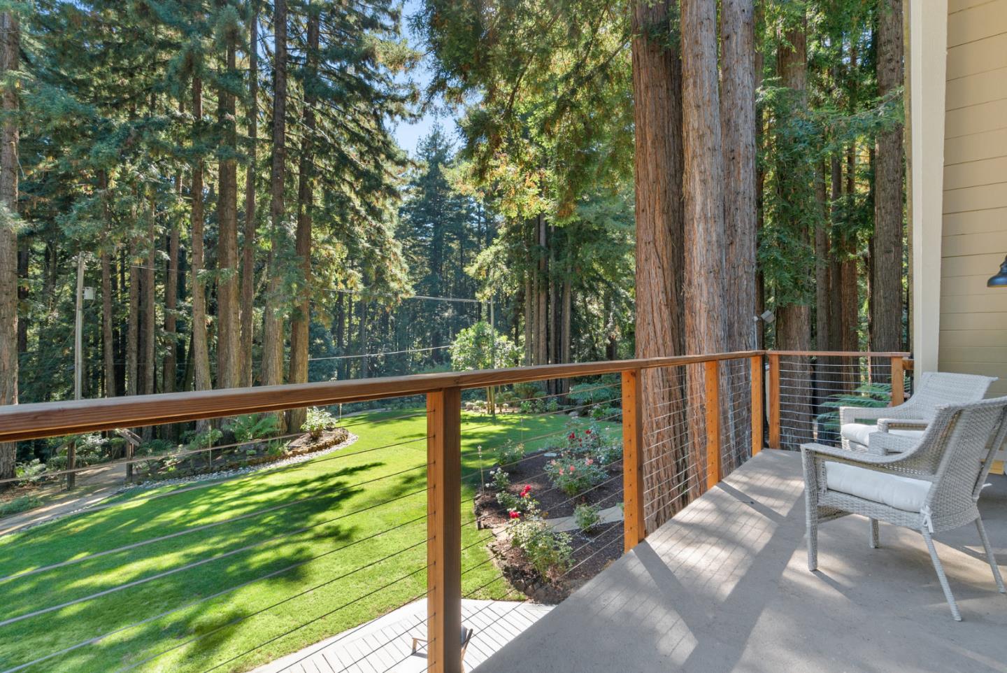 1695 Aptos Creek Road Aptos, CA 95003 - Photo 47 of 76 a view of a two chairs in the deck