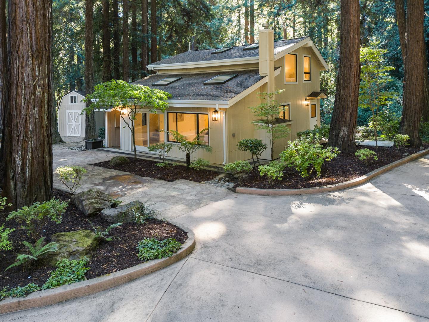 1695 Aptos Creek Road Aptos, CA 95003 - Photo 48 of 76 a front view of a house with a yard