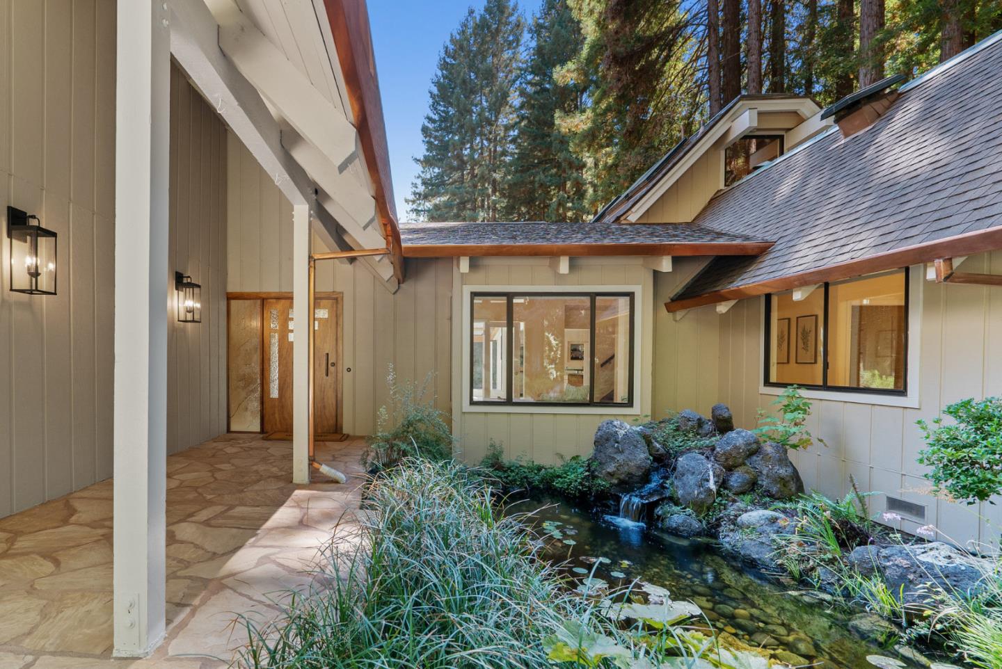 1695 Aptos Creek Road Aptos, CA 95003 - Photo 8 of 76 a front view of a house with garden