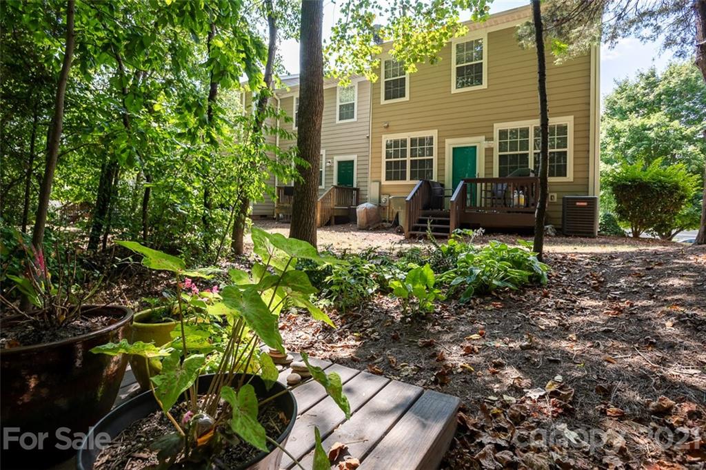 131 High Ridge Road Mooresville, NC 28117 - Photo 34 of 40 a view of a house with a garden