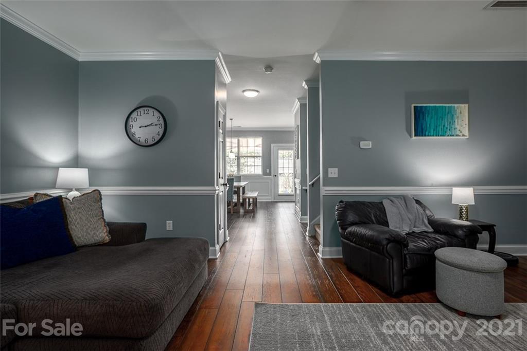 131 High Ridge Road Mooresville, NC 28117 - Photo 8 of 40 a living room with furniture and wooden floor