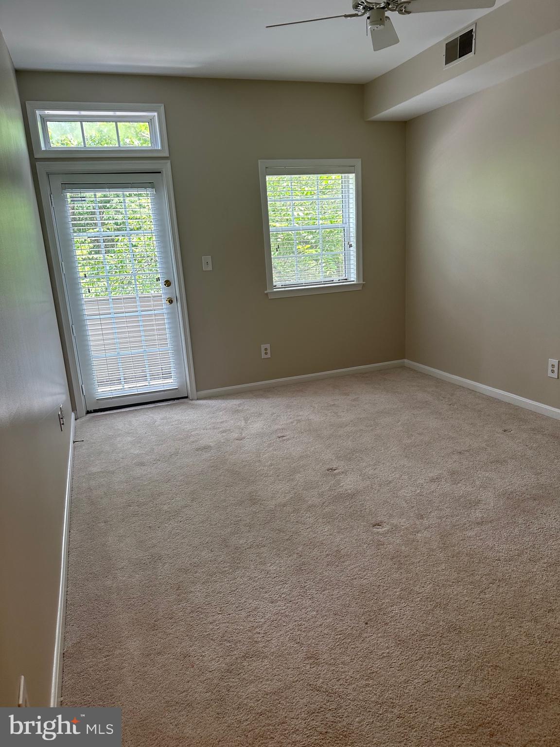 1324D Garden Wall Circle, Unit 306 Reston, VA 20194 - Photo 11 of 12 an empty room with windows
