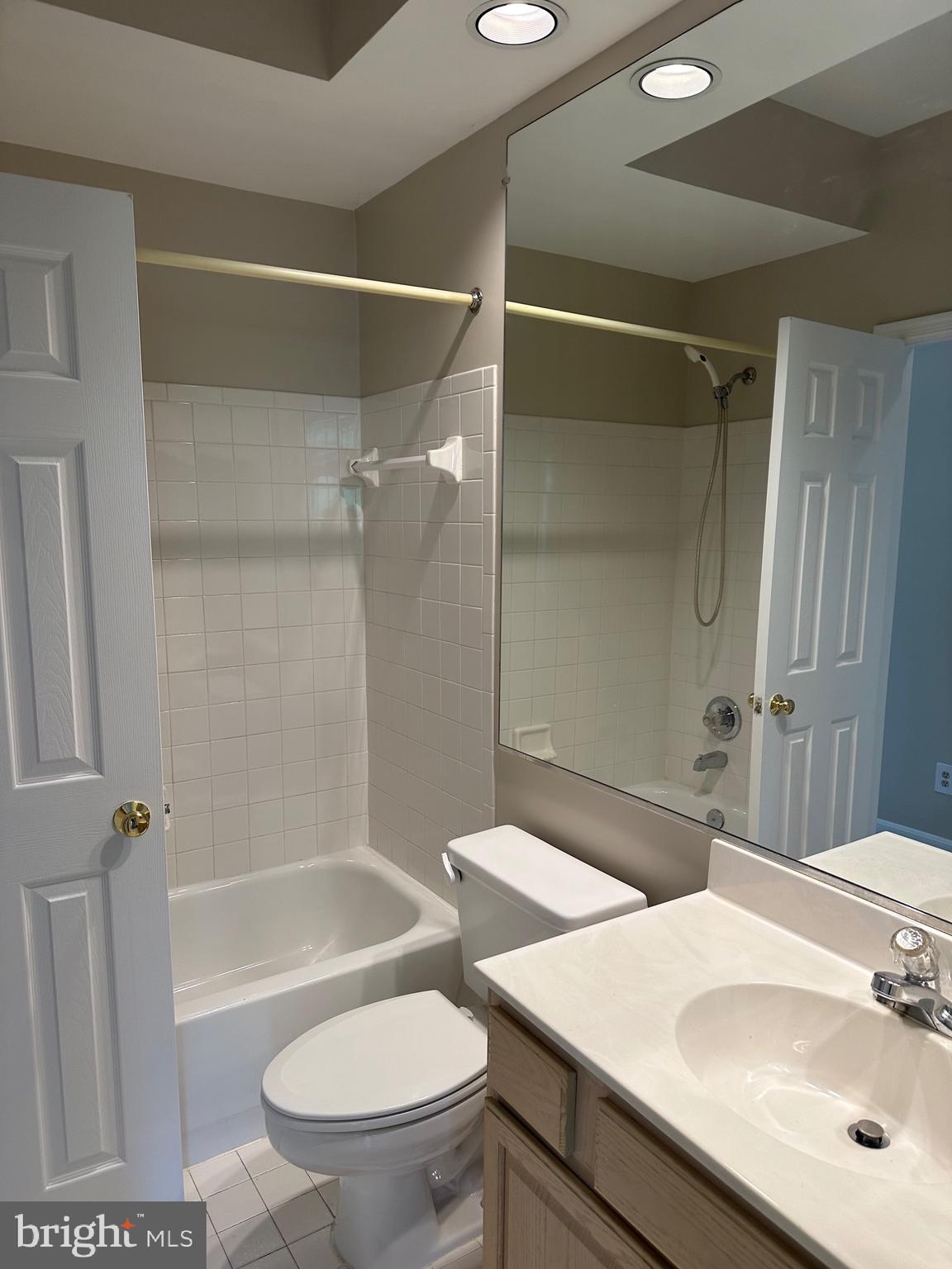 1324D Garden Wall Circle, Unit 306 Reston, VA 20194 - Photo 8 of 12 a bathroom with a sink toilet and shower