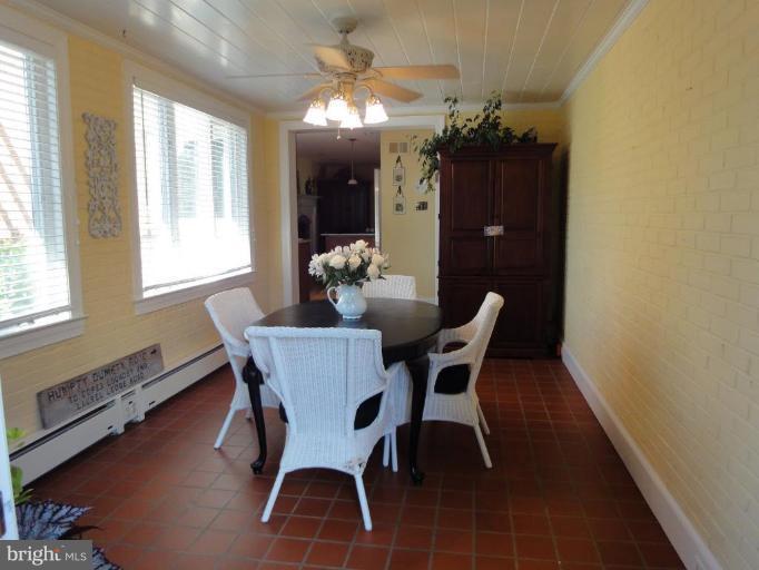 15306 Merrifields Court Silver Spring, MD 20906 - Photo 24 of 26 Sunroom/Bkfst Rm from exit door