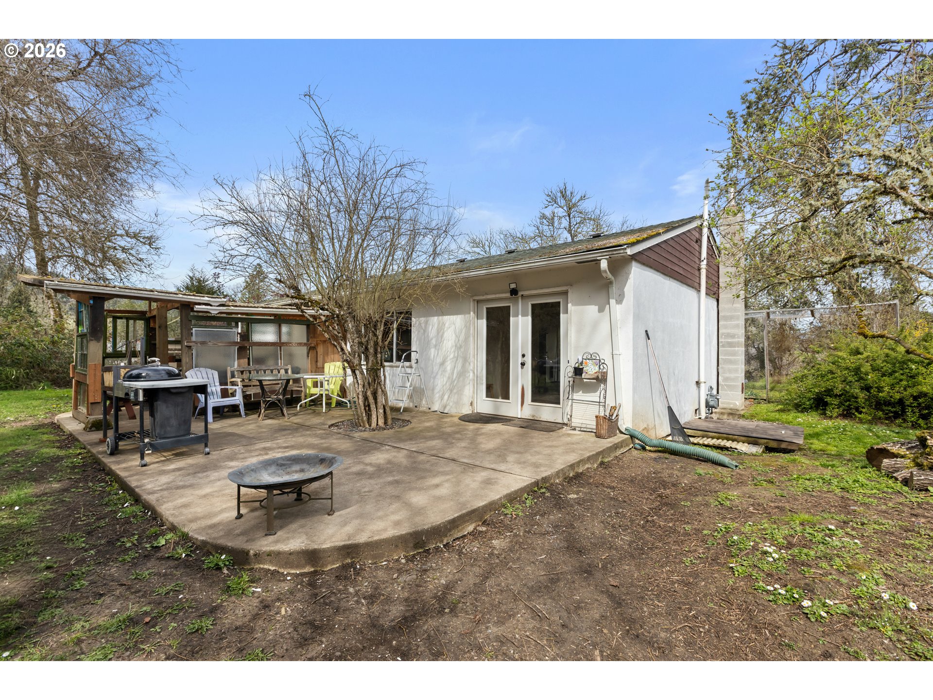 4178 Old Melrose Road Roseburg, OR 97471 - Photo 12 of 19 a view of a house with patio