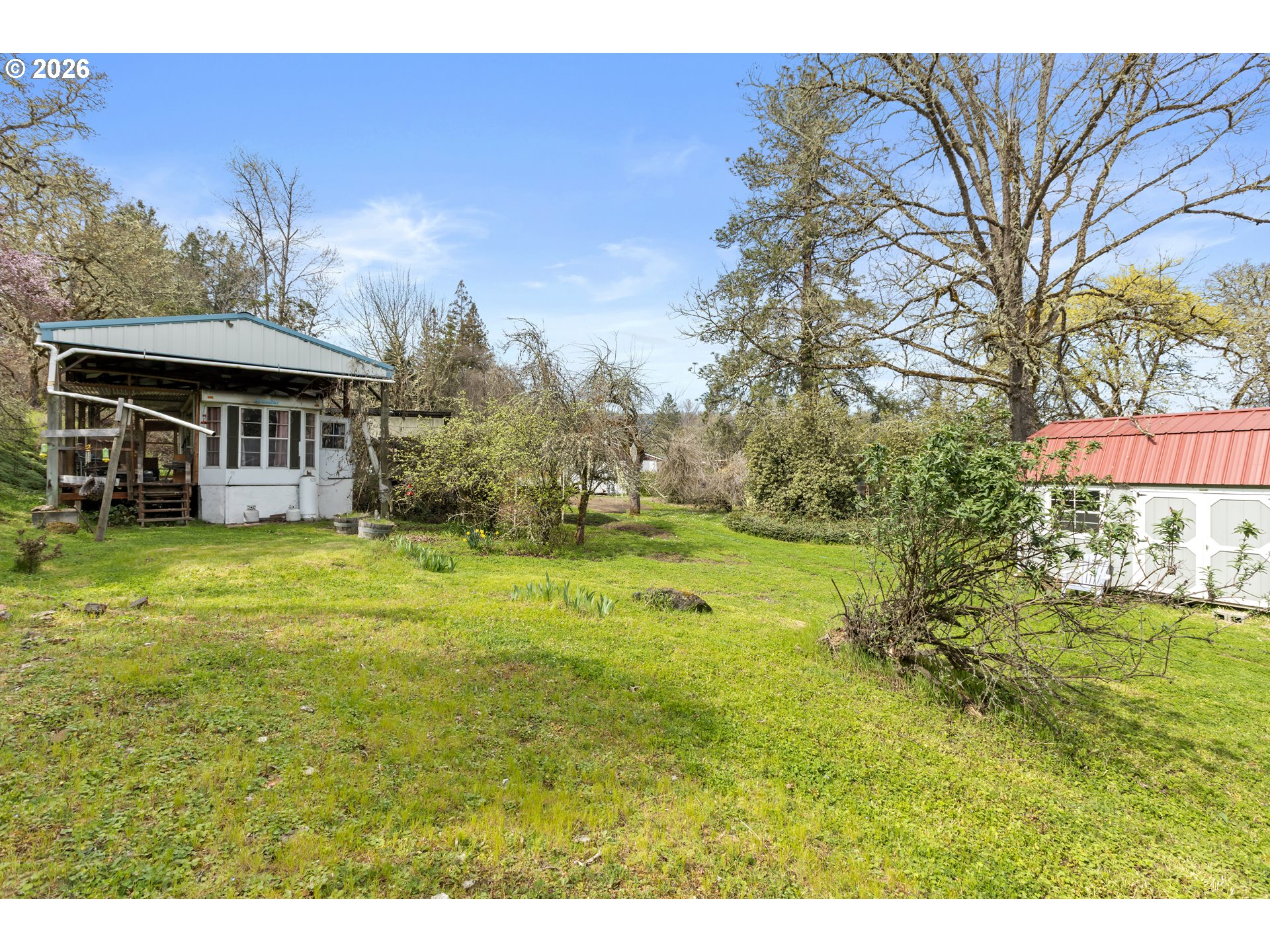 4178 Old Melrose Road Roseburg, OR 97471 - Photo 15 of 19 a view of a house with a garden
