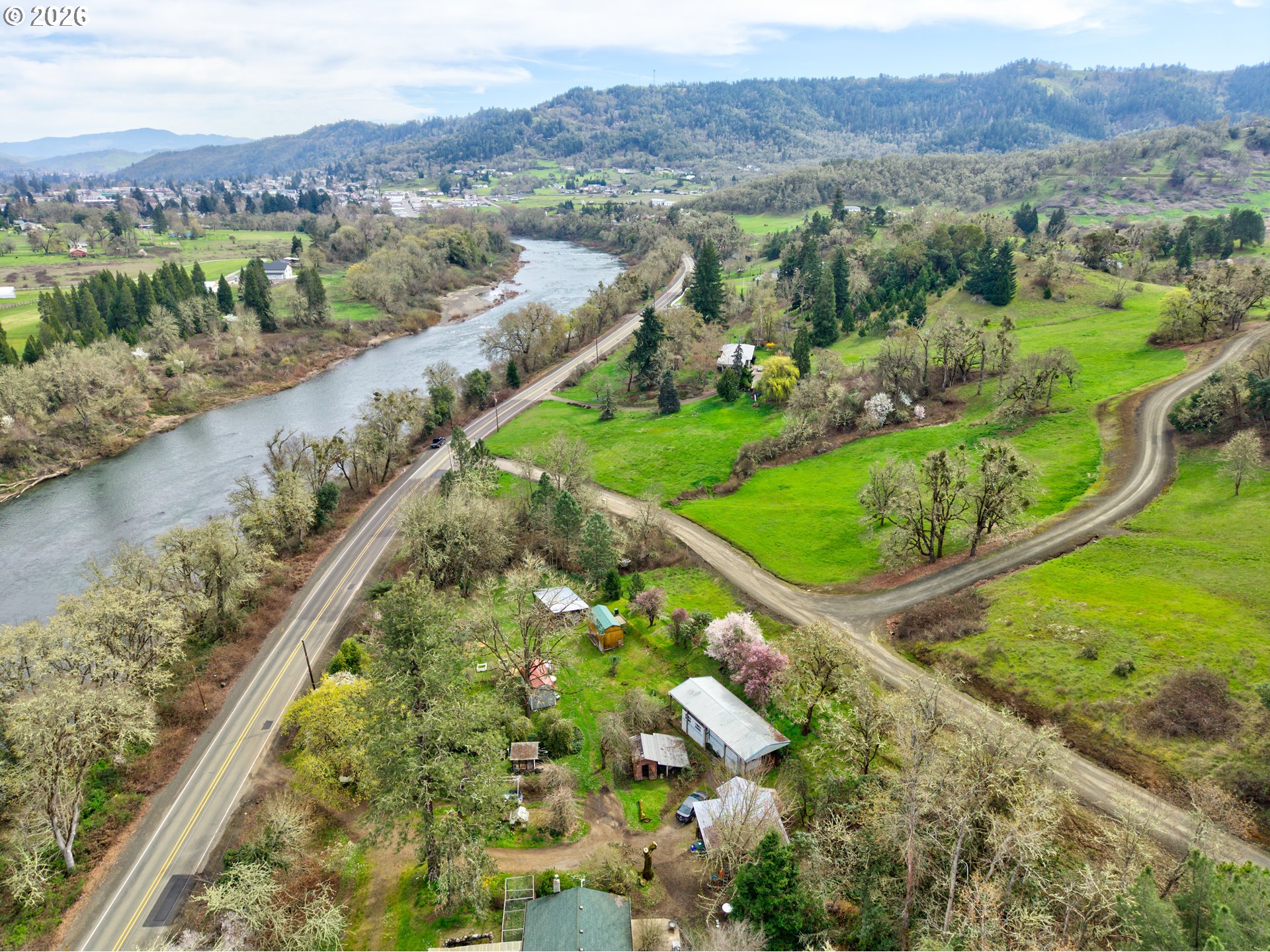 4178 Old Melrose Road Roseburg, OR 97471 - Photo 17 of 19 an aerial view of lake residential house with swimming pool and green space