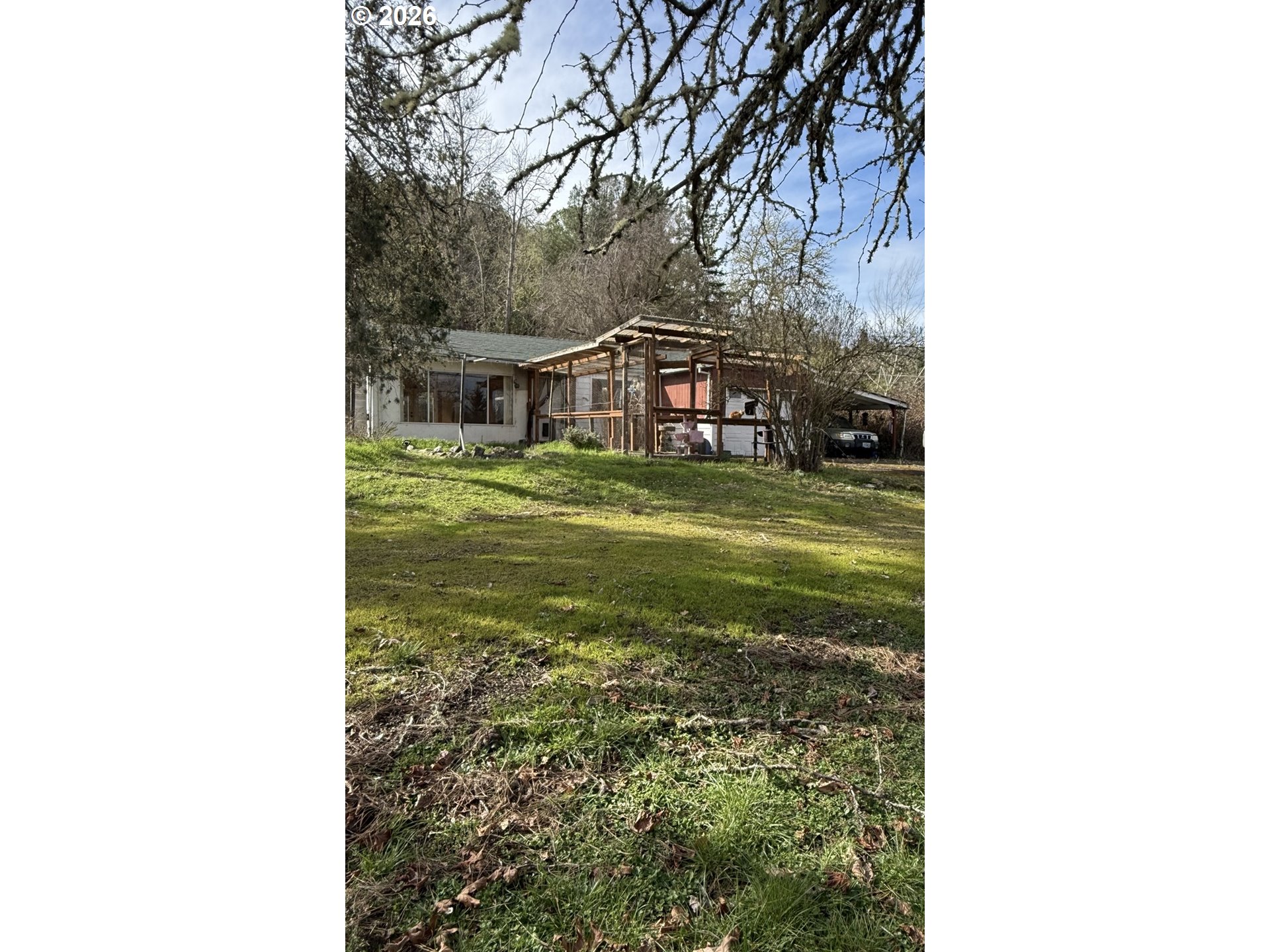 4178 Old Melrose Road Roseburg, OR 97471 - Photo 2 of 19 a view of a yard in front of a house