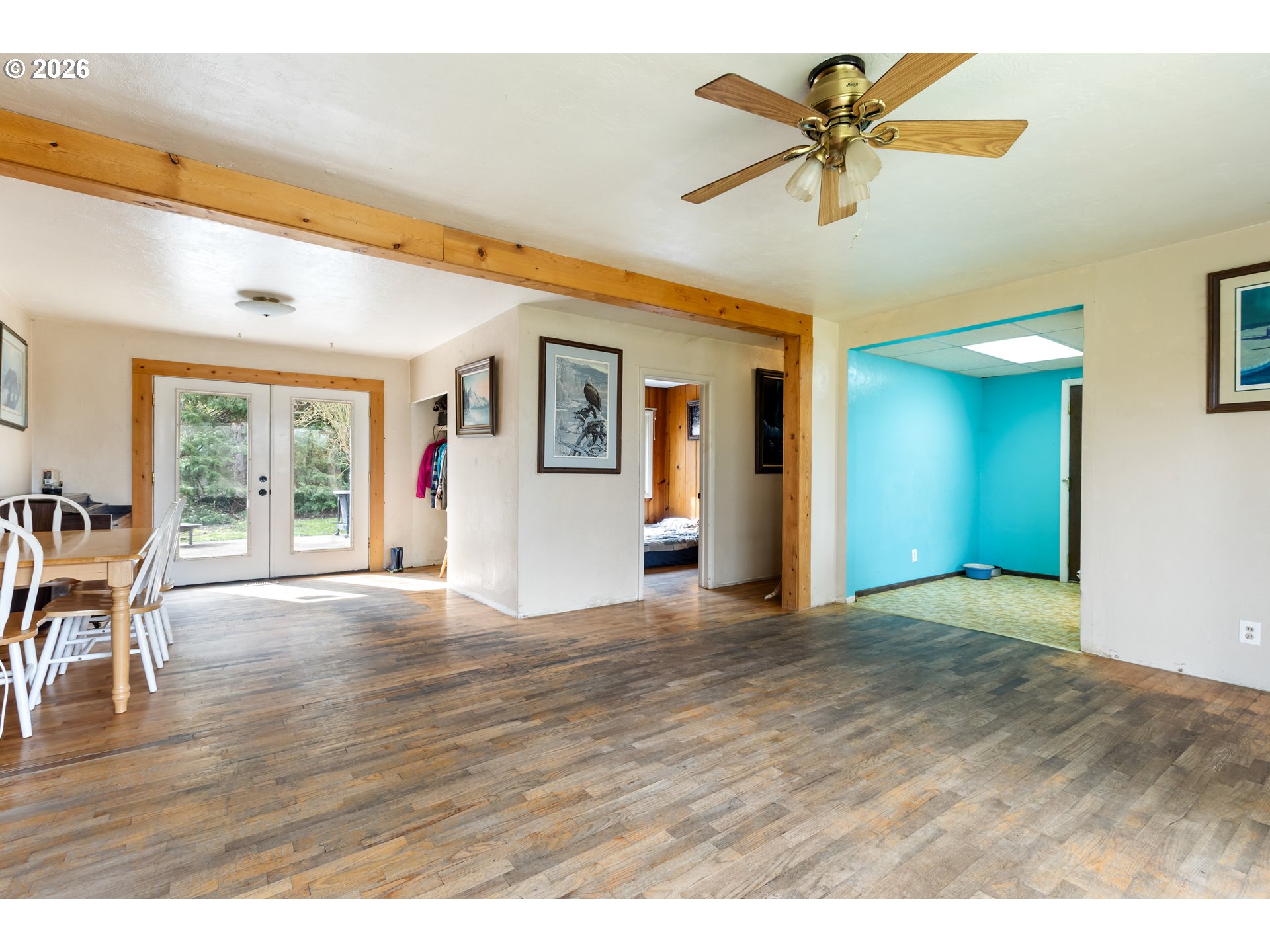 4178 Old Melrose Road Roseburg, OR 97471 - Photo 4 of 19 a view of an empty room with window and wooden floor