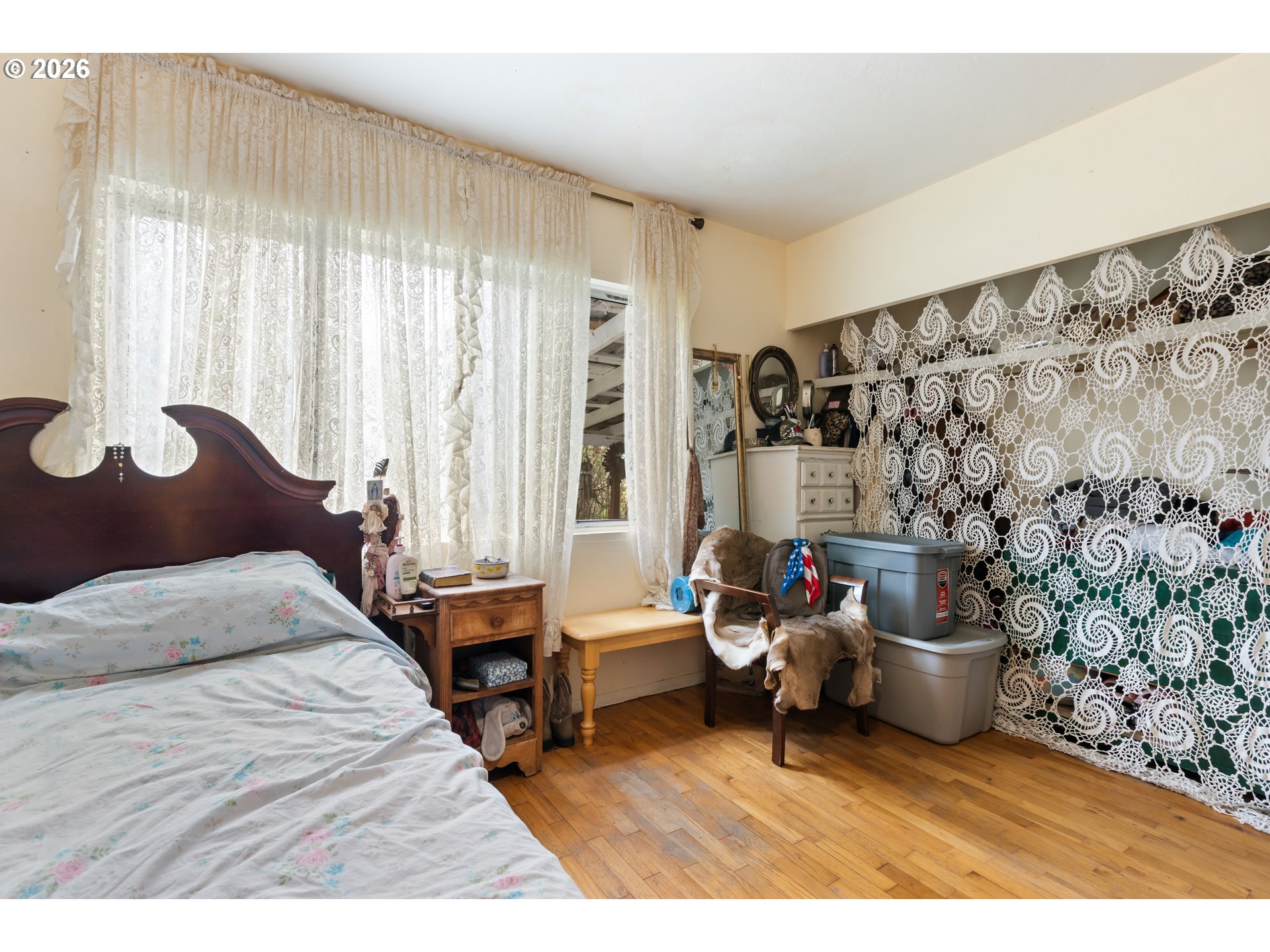 4178 Old Melrose Road Roseburg, OR 97471 - Photo 6 of 19 a bedroom with a bed and a window