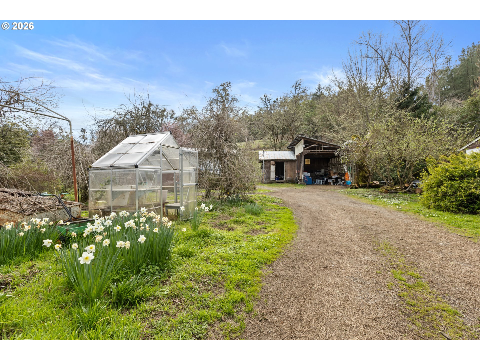 4178 Old Melrose Road Roseburg, OR 97471 - Photo 8 of 19 a view of a house with yard and sitting area