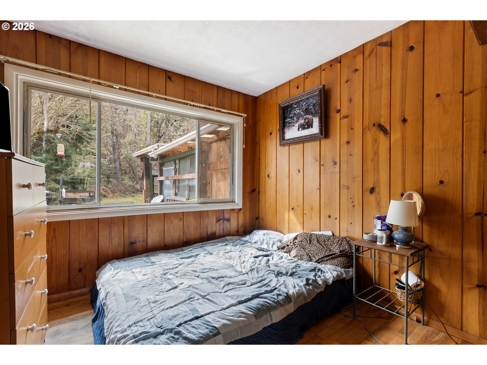 4178 Old Melrose Road Roseburg, OR 97471 - Photo 10 of 19 a bedroom with a bed and a window