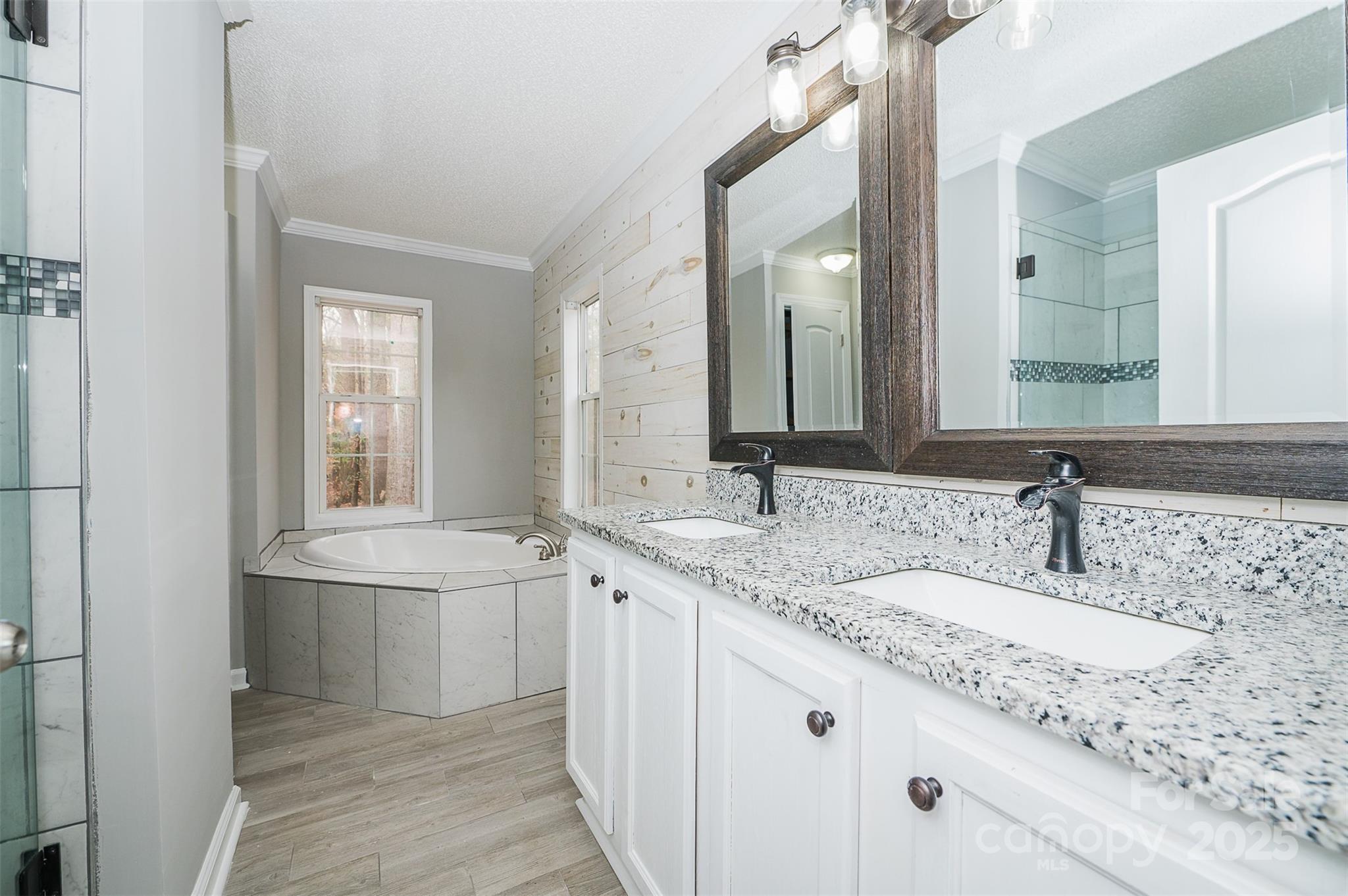 8226 Malibu Road Mount Pleasant, NC 28124 - Photo 19 of 44 a bathroom with a sink and a mirror