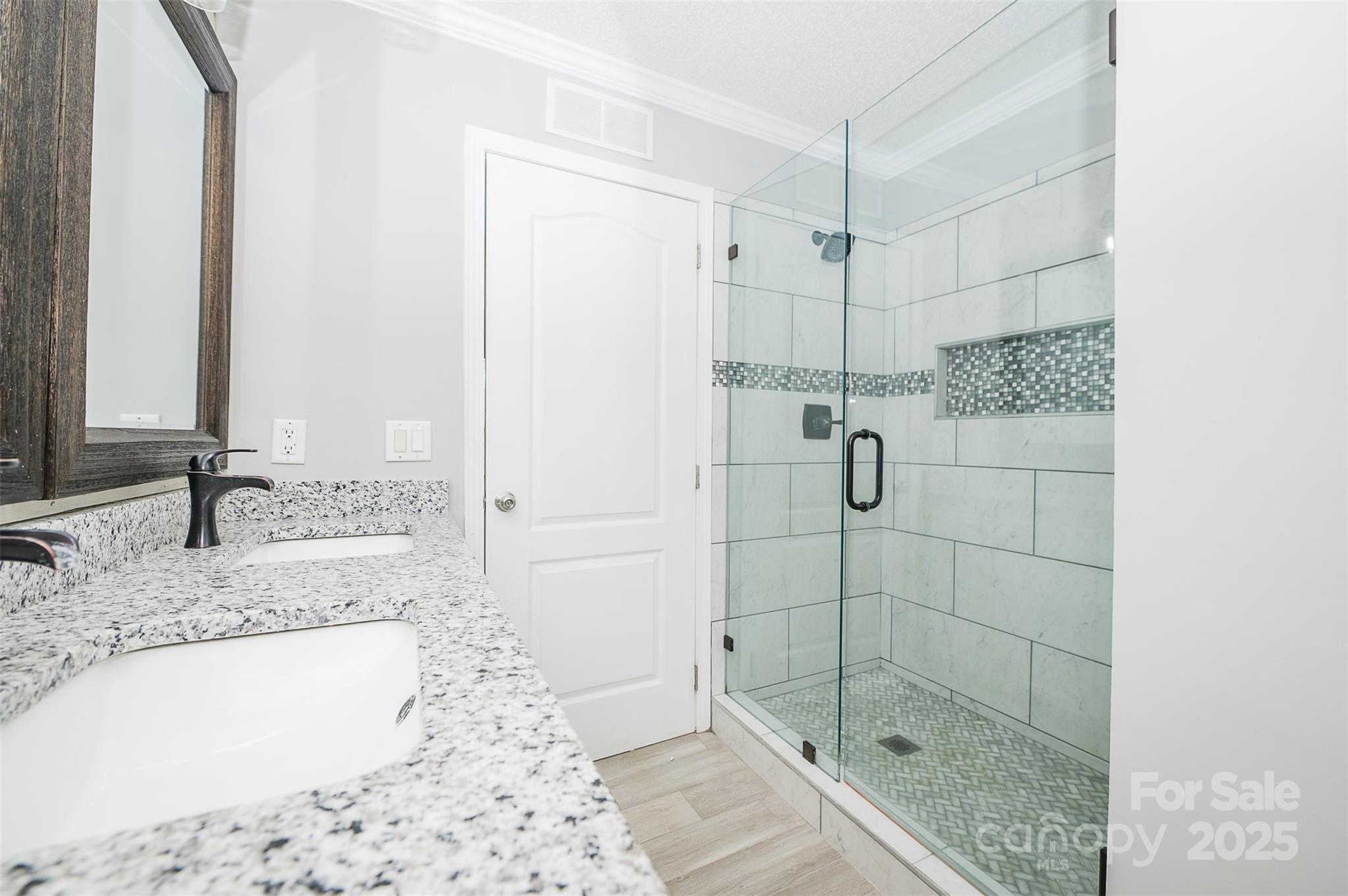 8226 Malibu Road Mount Pleasant, NC 28124 - Photo 21 of 44 a bathroom with a shower and a sink