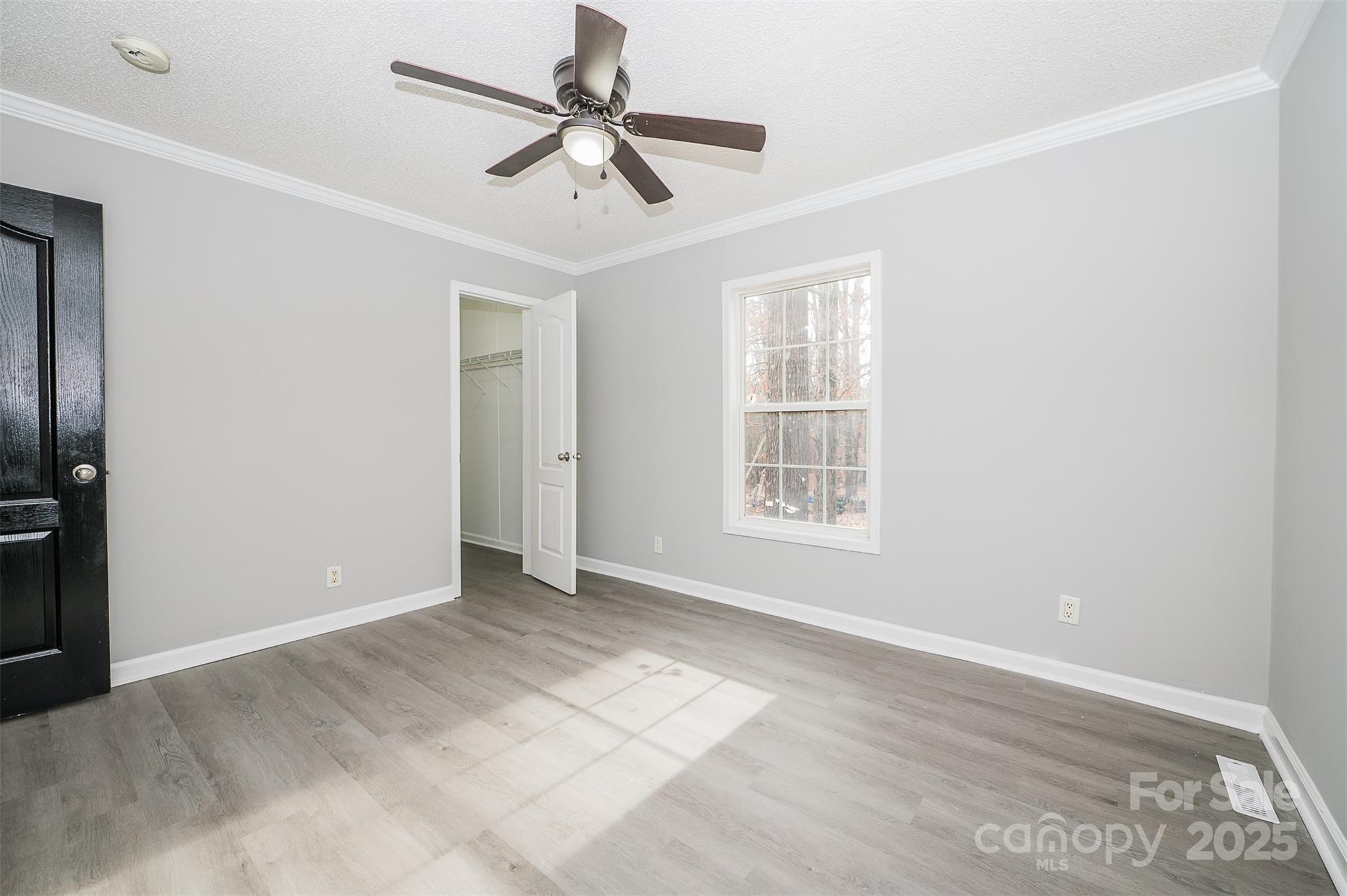 8226 Malibu Road Mount Pleasant, NC 28124 - Photo 29 of 44 a view of an empty room with a window