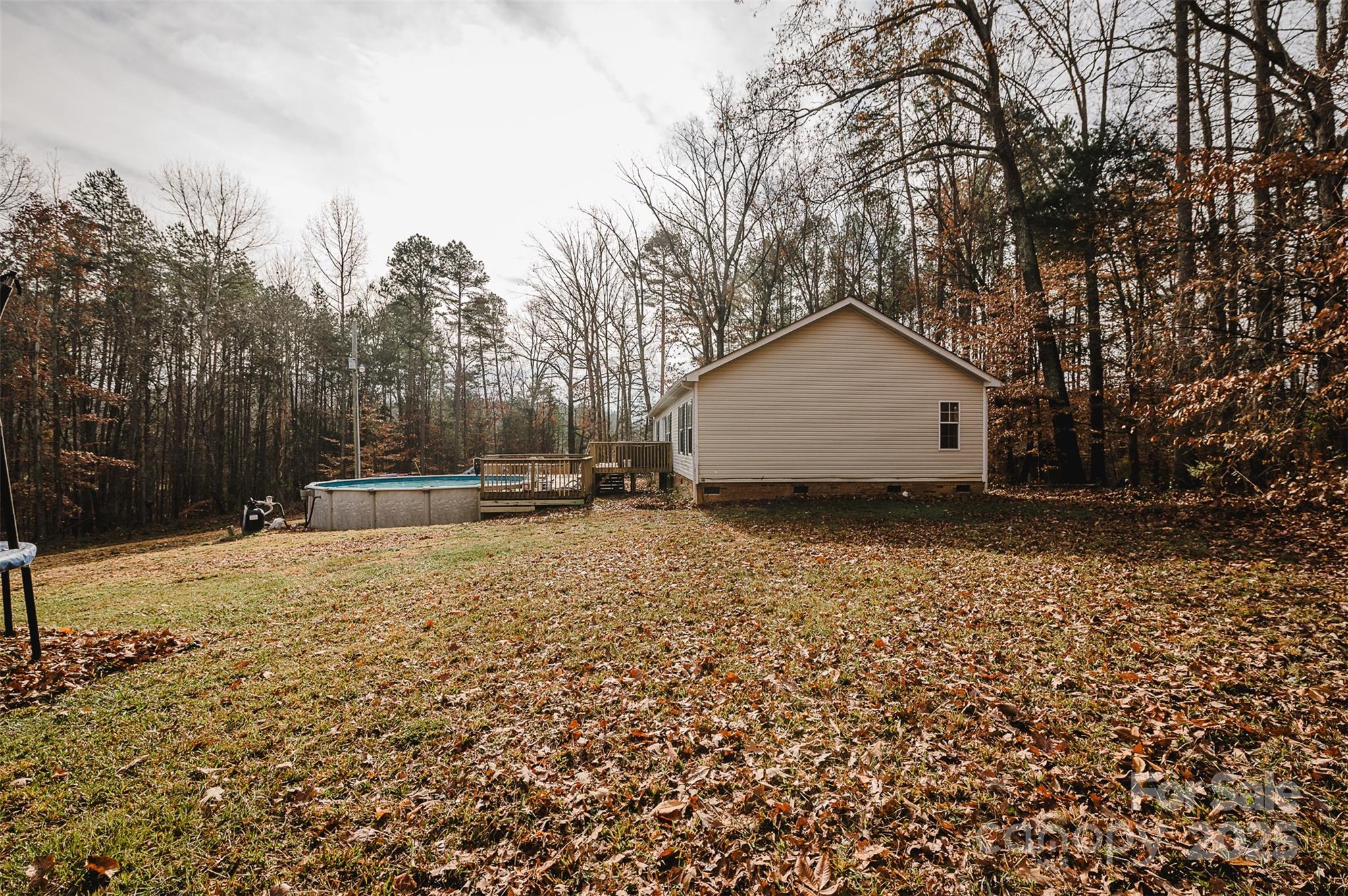 8226 Malibu Road Mount Pleasant, NC 28124 - Photo 37 of 44 a view of large house with a yard