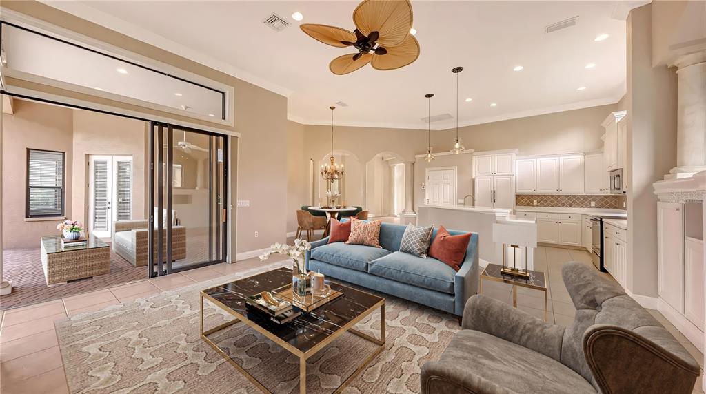 7134 Whitemarsh Circle Lakewood Ranch, FL 34202 - Photo 23 of 78 a living room with furniture and a large window