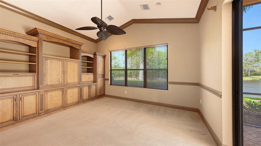 7134 Whitemarsh Circle Lakewood Ranch, FL 34202 - Photo 27 of 78 a view of an empty room with a window