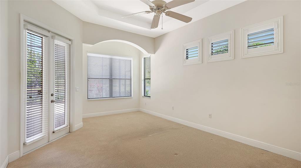 7134 Whitemarsh Circle Lakewood Ranch, FL 34202 - Photo 34 of 78 wooden floor in an empty room with a window