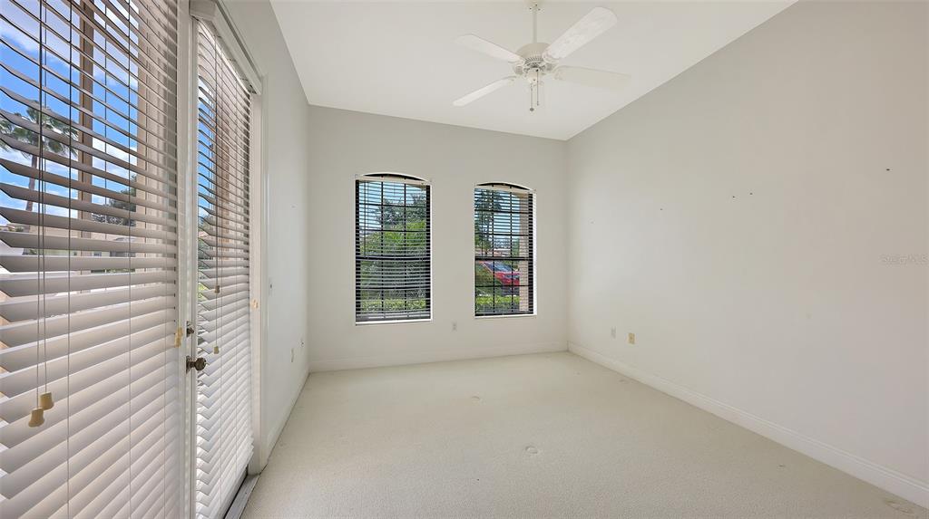 7134 Whitemarsh Circle Lakewood Ranch, FL 34202 - Photo 44 of 78 a view of an empty room with a window