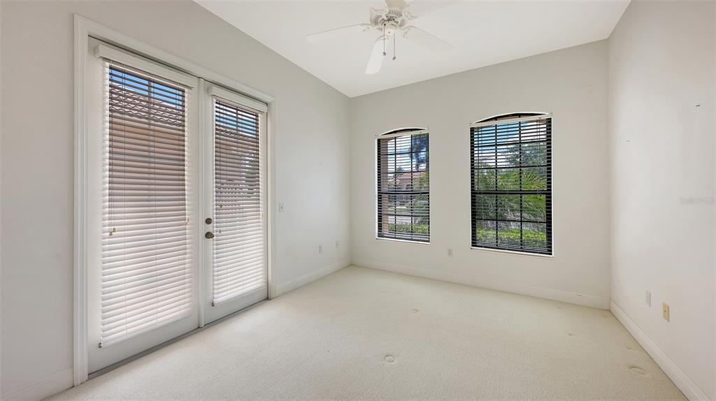 7134 Whitemarsh Circle Lakewood Ranch, FL 34202 - Photo 45 of 78 an empty room with windows