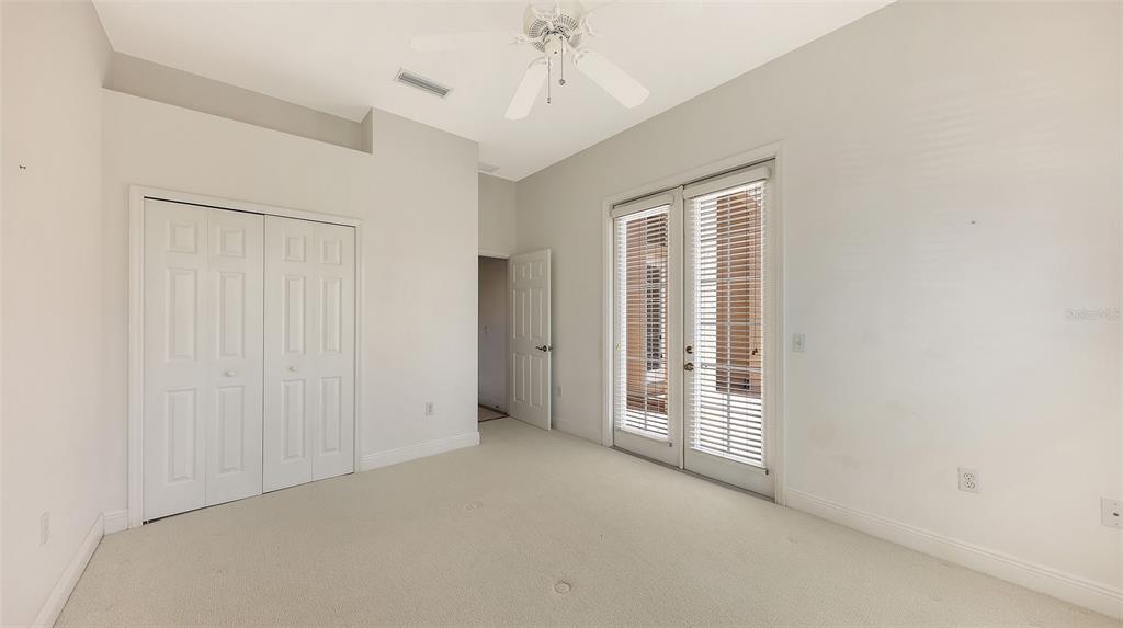 7134 Whitemarsh Circle Lakewood Ranch, FL 34202 - Photo 48 of 78 an empty room with windows