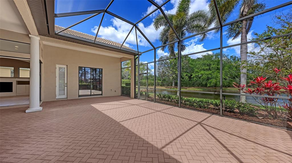 7134 Whitemarsh Circle Lakewood Ranch, FL 34202 - Photo 53 of 78 a view of a house with a yard