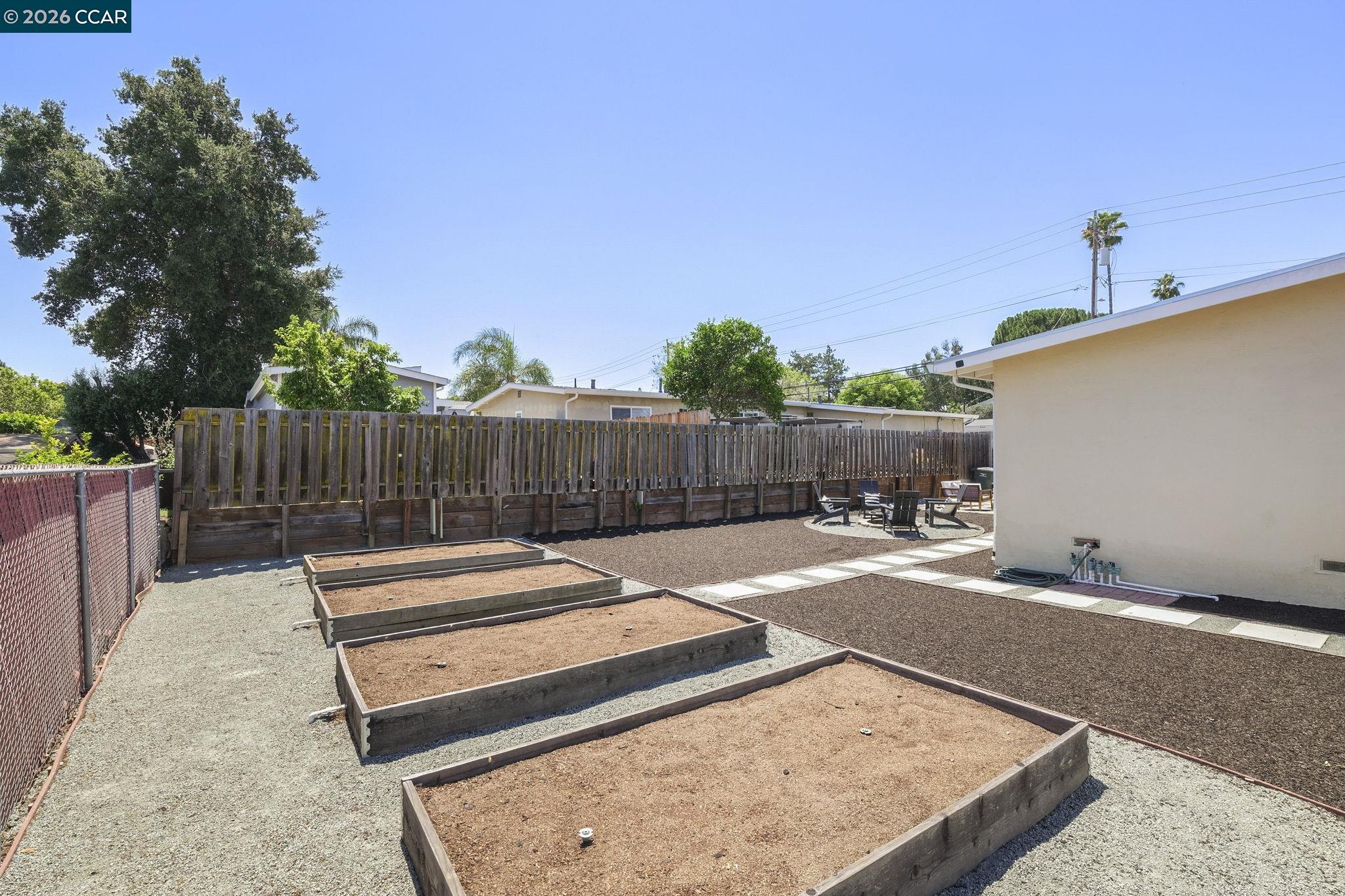 4311 Cowell Road Concord, CA 94521 - Photo 27 of 29 a backyard of a house with table and chairs