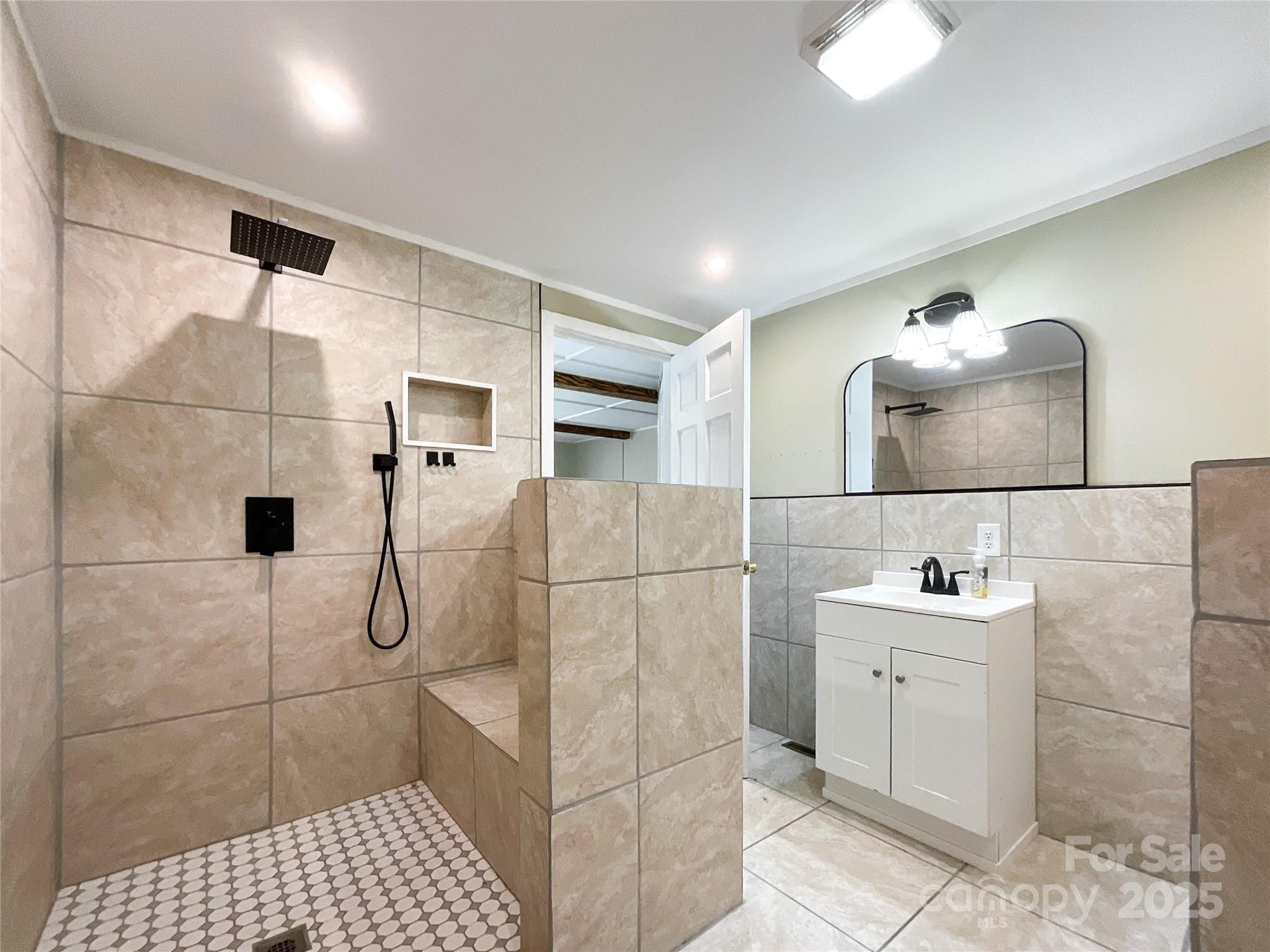 680 Mullinax Circle Blacksburg, SC 29702 - Photo 16 of 25 a bathroom with a sink and mirror
