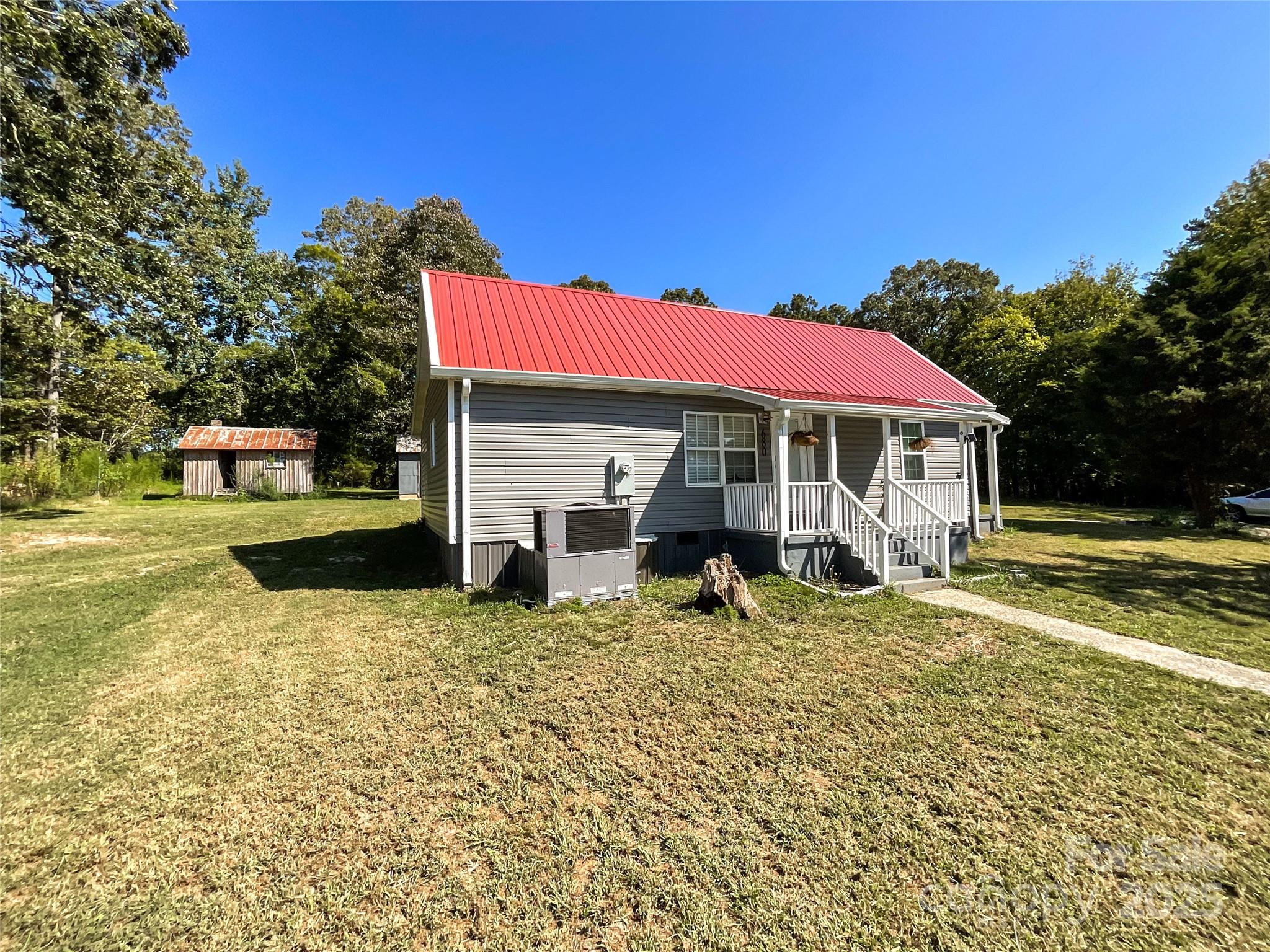 680 Mullinax Circle Blacksburg, SC 29702 - Photo 17 of 25 a view of a house with a yard