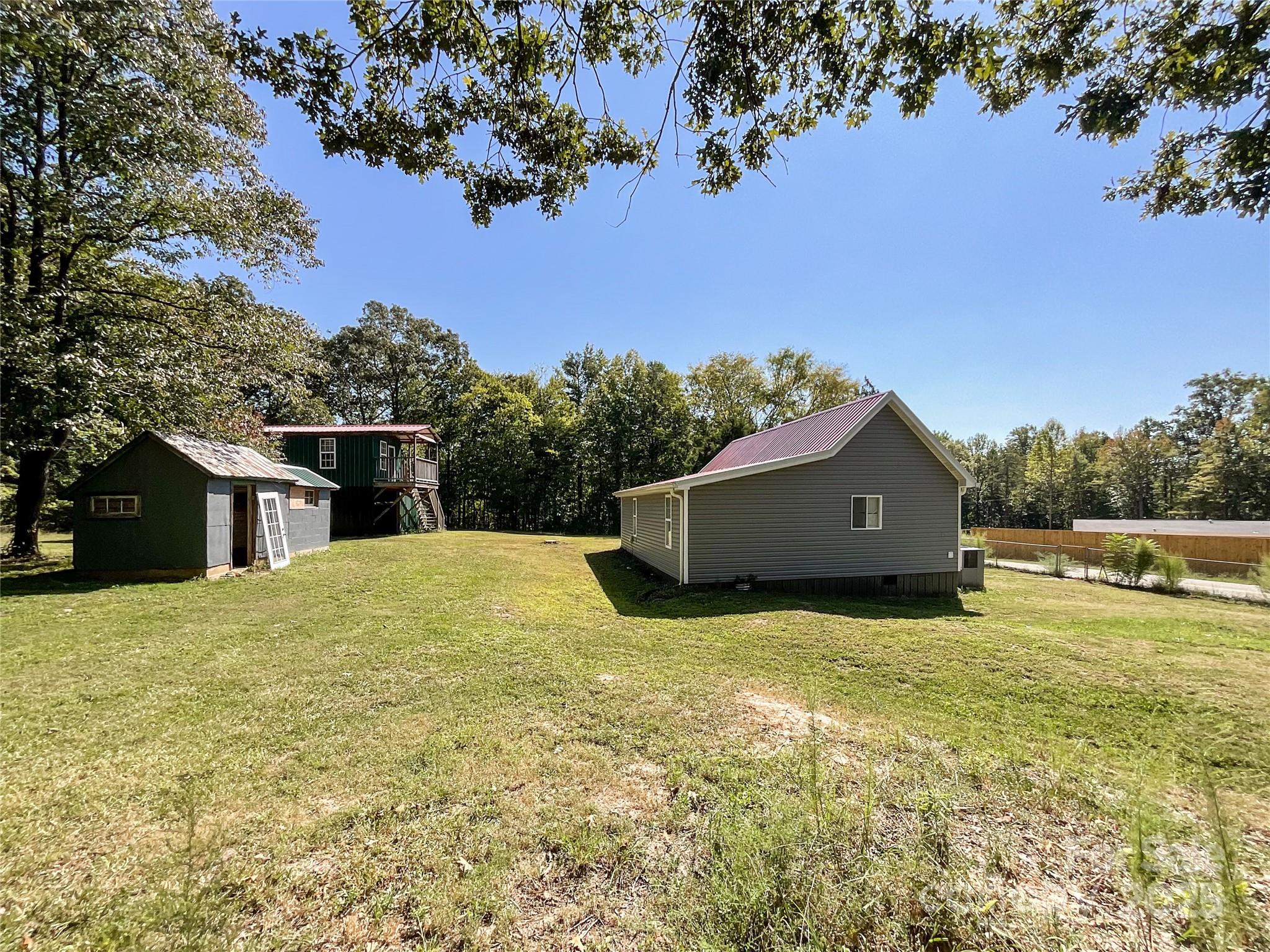 680 Mullinax Circle Blacksburg, SC 29702 - Photo 19 of 25 a backyard of a house with lots of green space