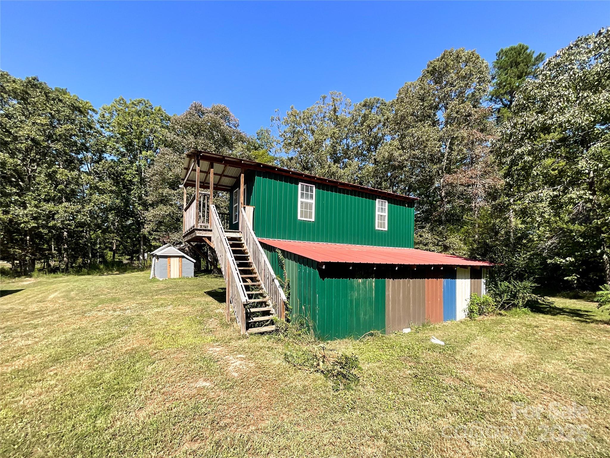 680 Mullinax Circle Blacksburg, SC 29702 - Photo 21 of 25 a view of a house with a yard