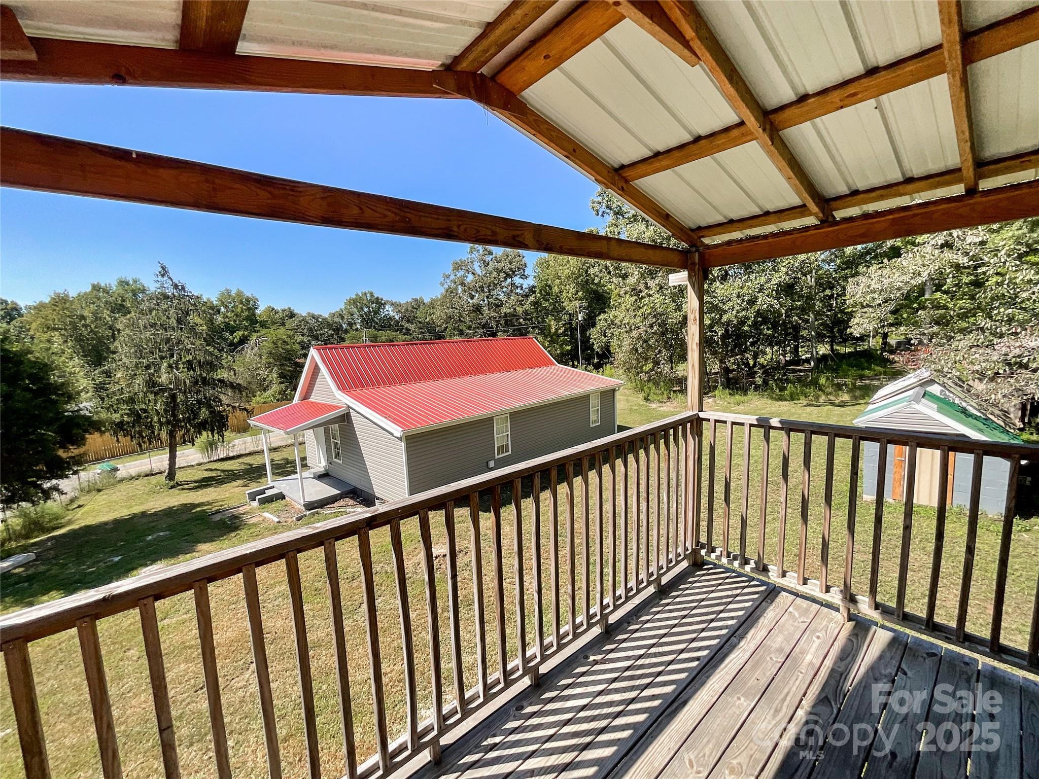 680 Mullinax Circle Blacksburg, SC 29702 - Photo 24 of 25 a view of a balcony with wooden floor and outdoor space