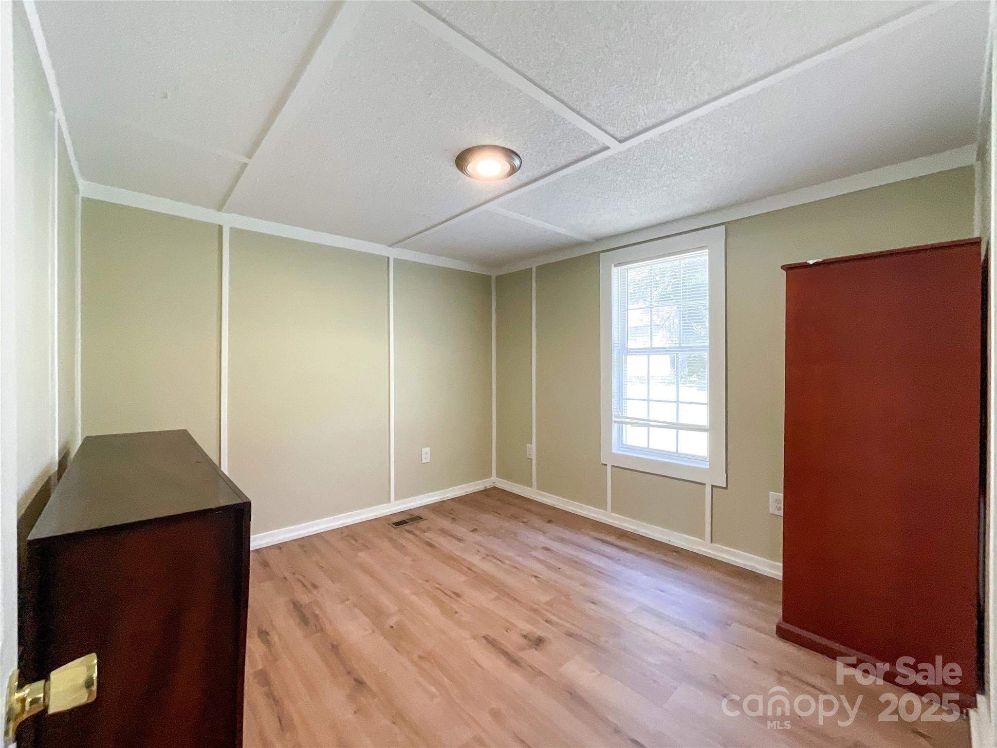 680 Mullinax Circle Blacksburg, SC 29702 - Photo 6 of 25 an empty room with windows and closet
