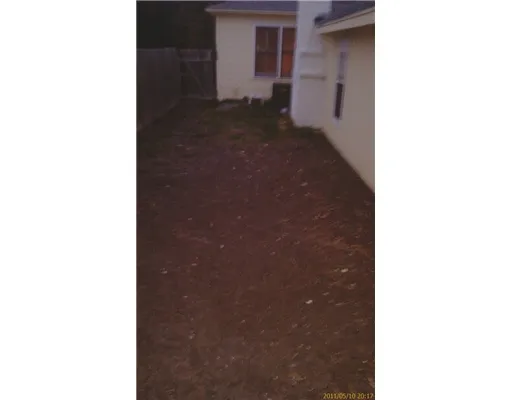 a picture of a bathroom with a sink