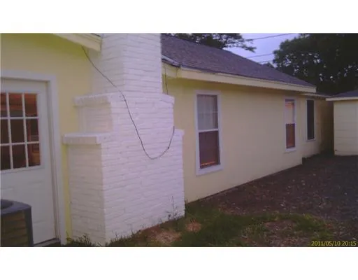 a black and white photo of a house