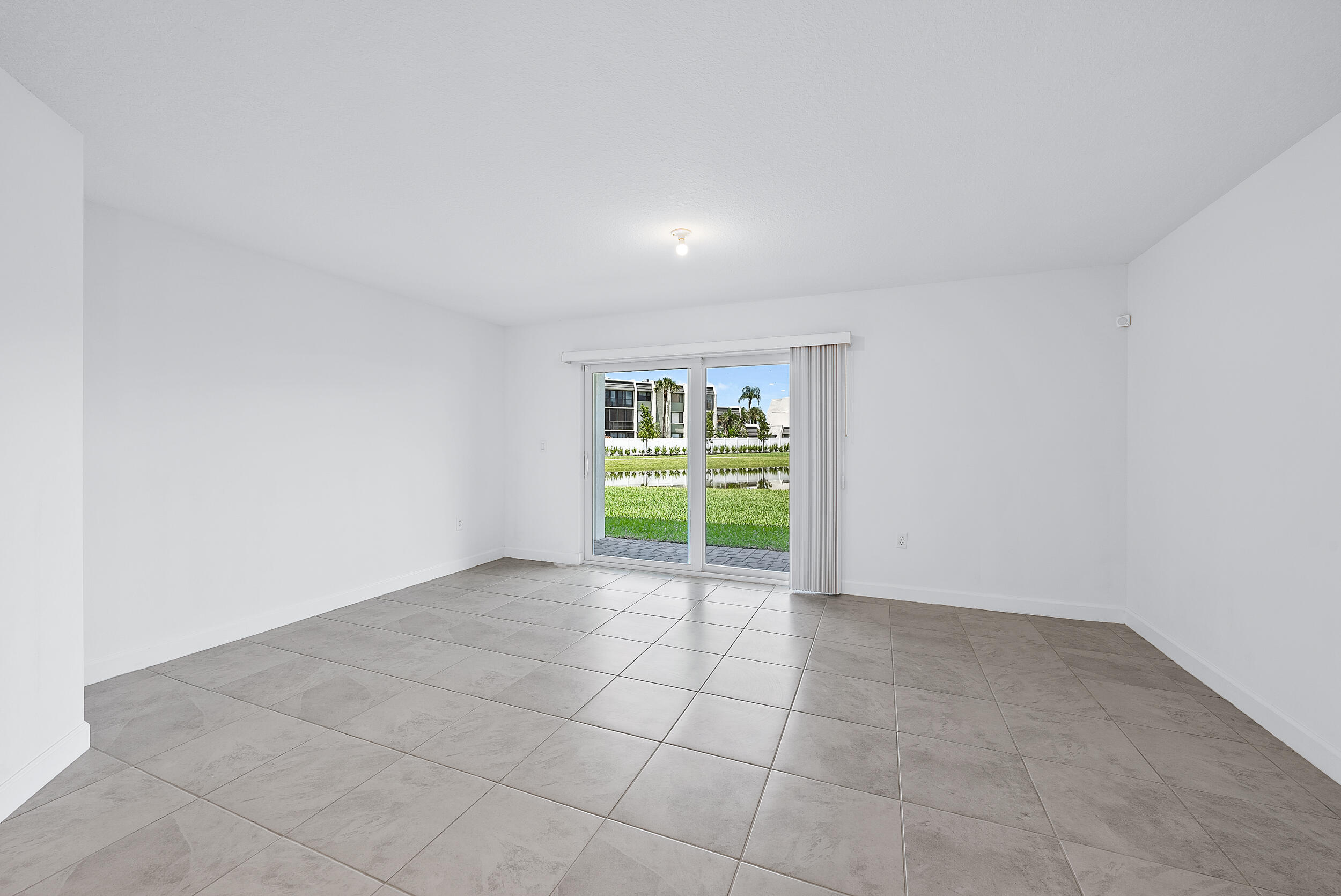 4215 Bent River Road Lake Worth, FL 33467 - Photo 11 of 29 a view of an empty room with a window