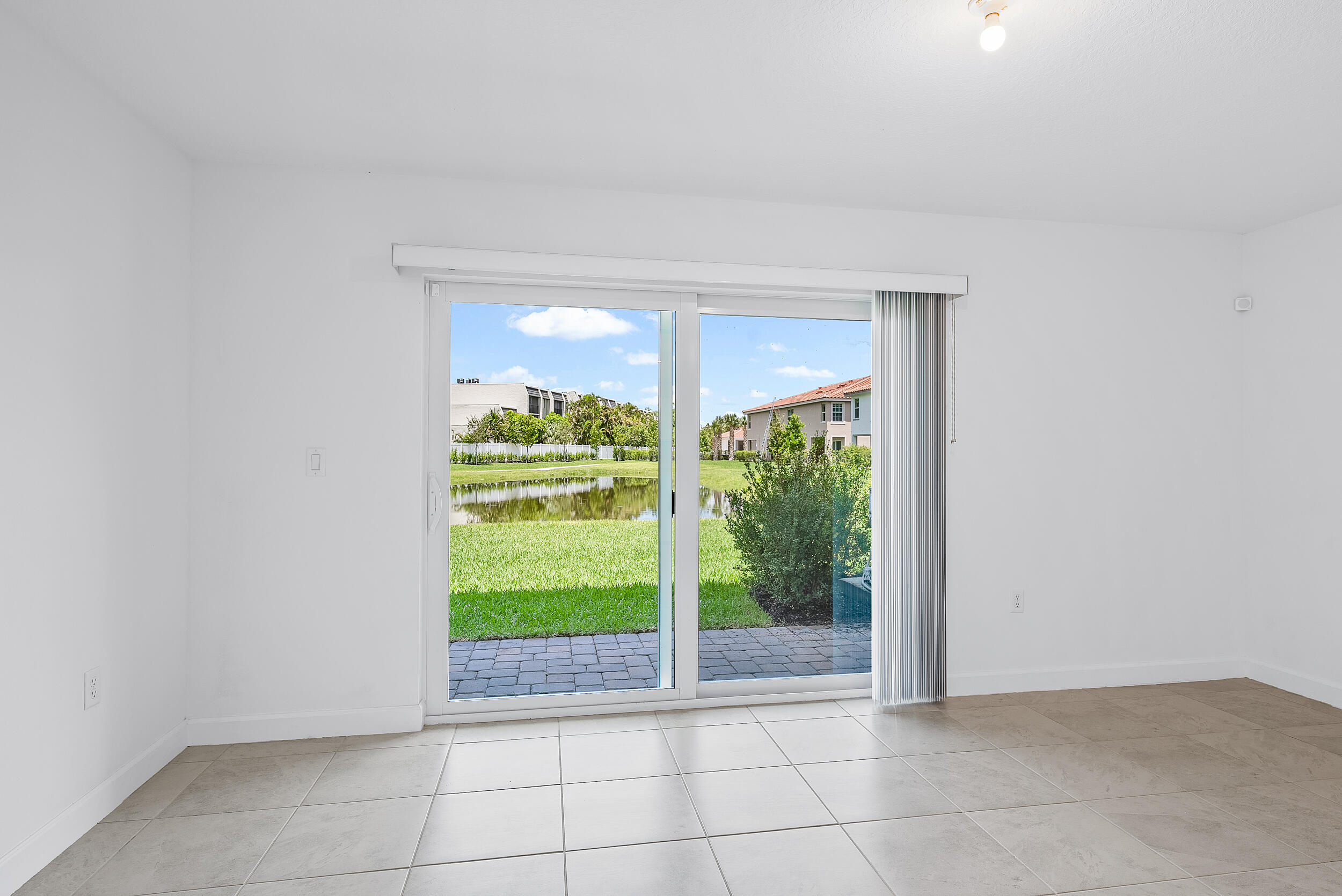 4215 Bent River Road Lake Worth, FL 33467 - Photo 12 of 29 a view of an empty room with a window