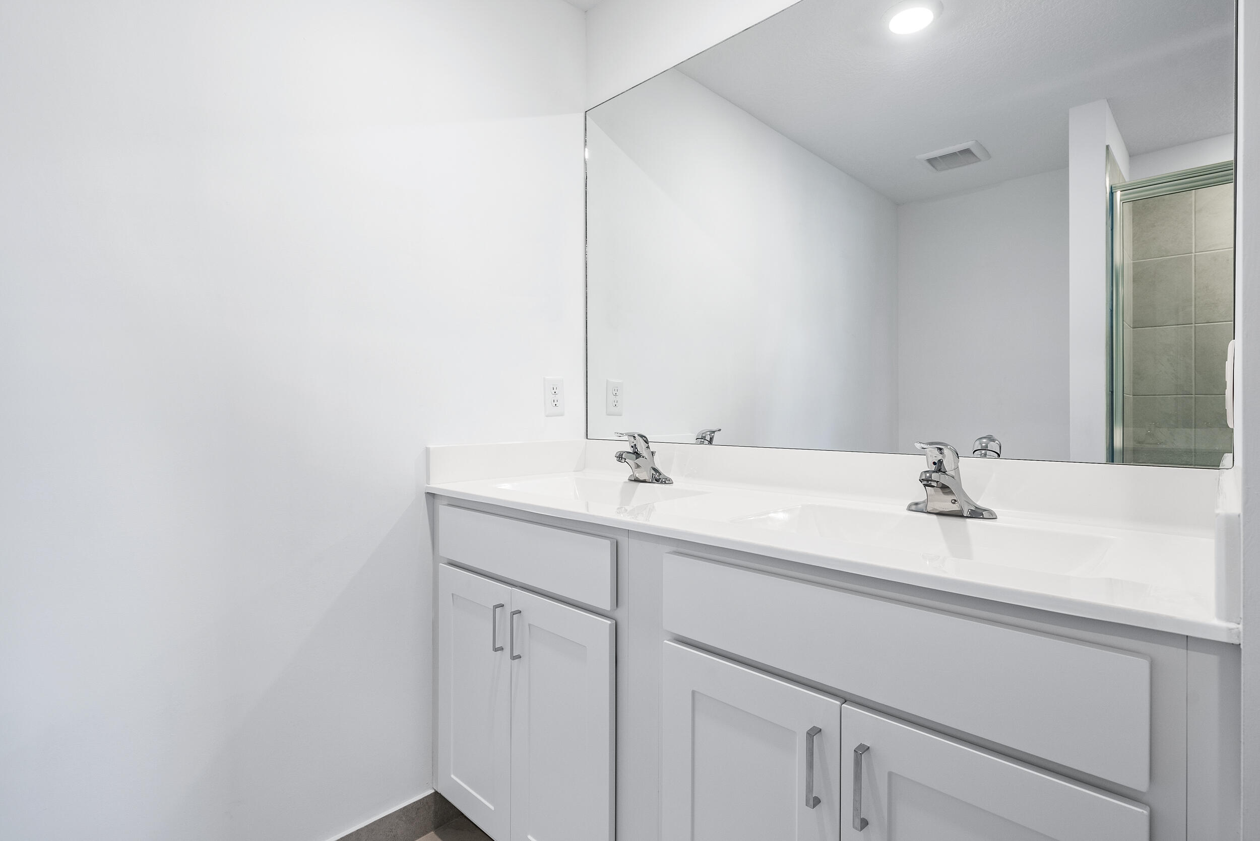 4215 Bent River Road Lake Worth, FL 33467 - Photo 18 of 29 a bathroom with a sink and a mirror
